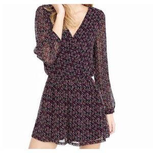 Express Women's Romper Sz Small Long Sleeve Black w multicolor Print Sheer Lined